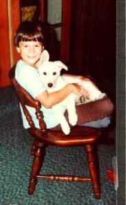 Brad was sort of a St. Francis type of guy as he loved animals and had many pets. Here he is holding our albino runaway dog, "Duchess".