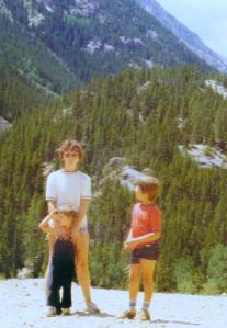 Standing at the foot of the Rockies with me and his brother, age 3.
